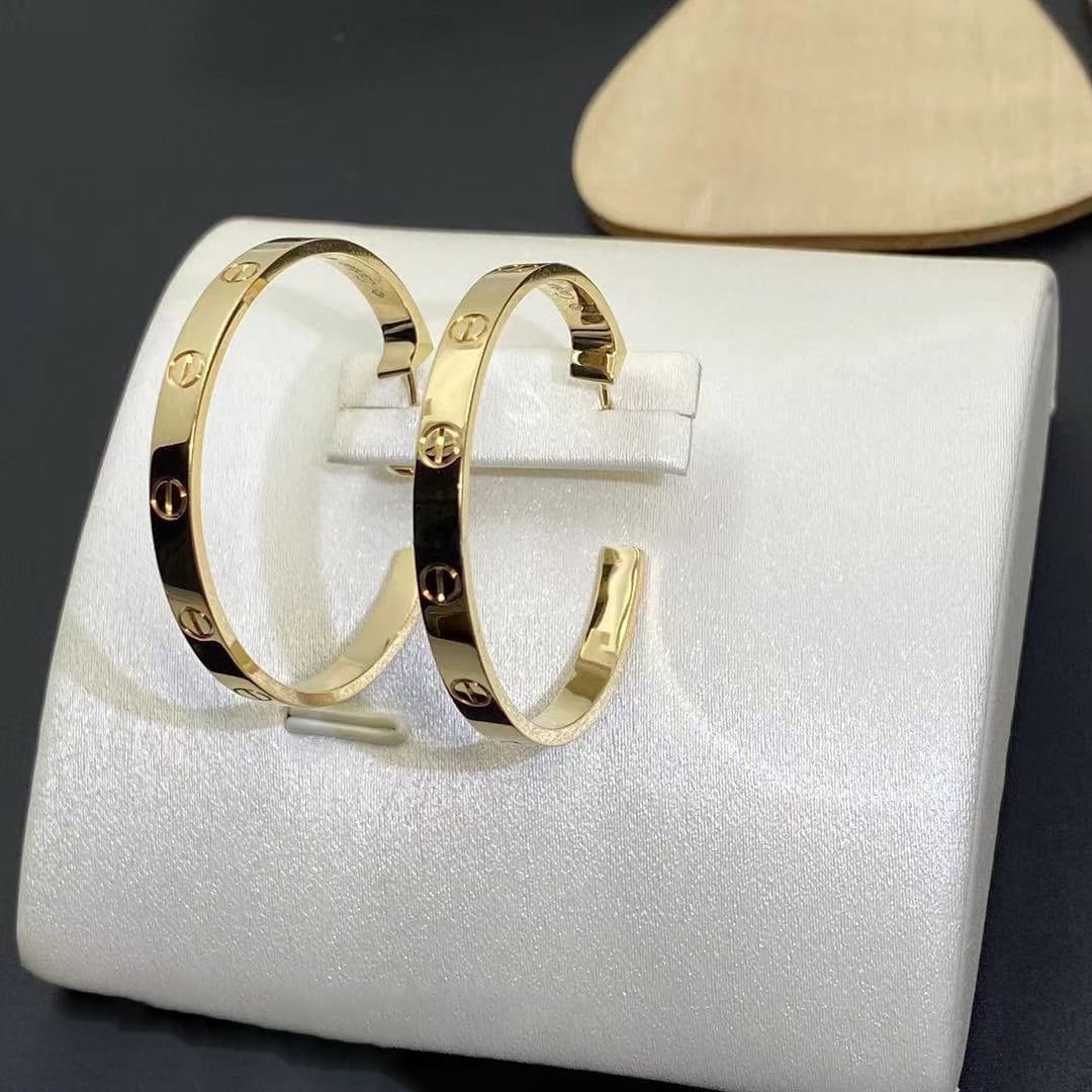 Серьги Cartier Love из желтого золота 5