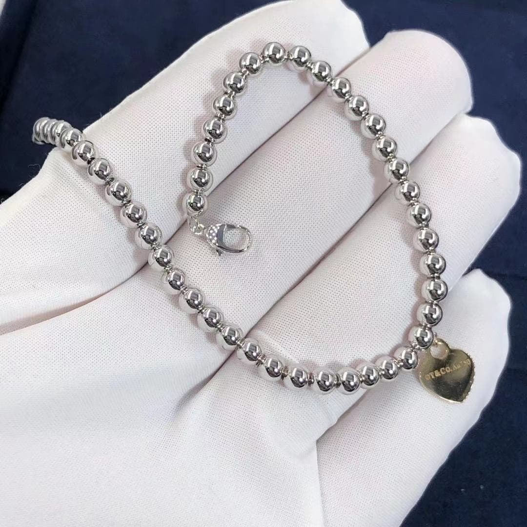 Браслет Tiffany с бусинами из белого золота 3