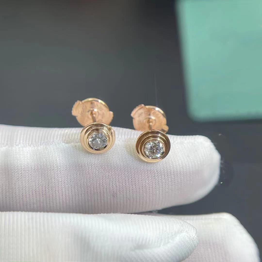 Золотые серьги Cartier с бриллиантом 0,27ct 1