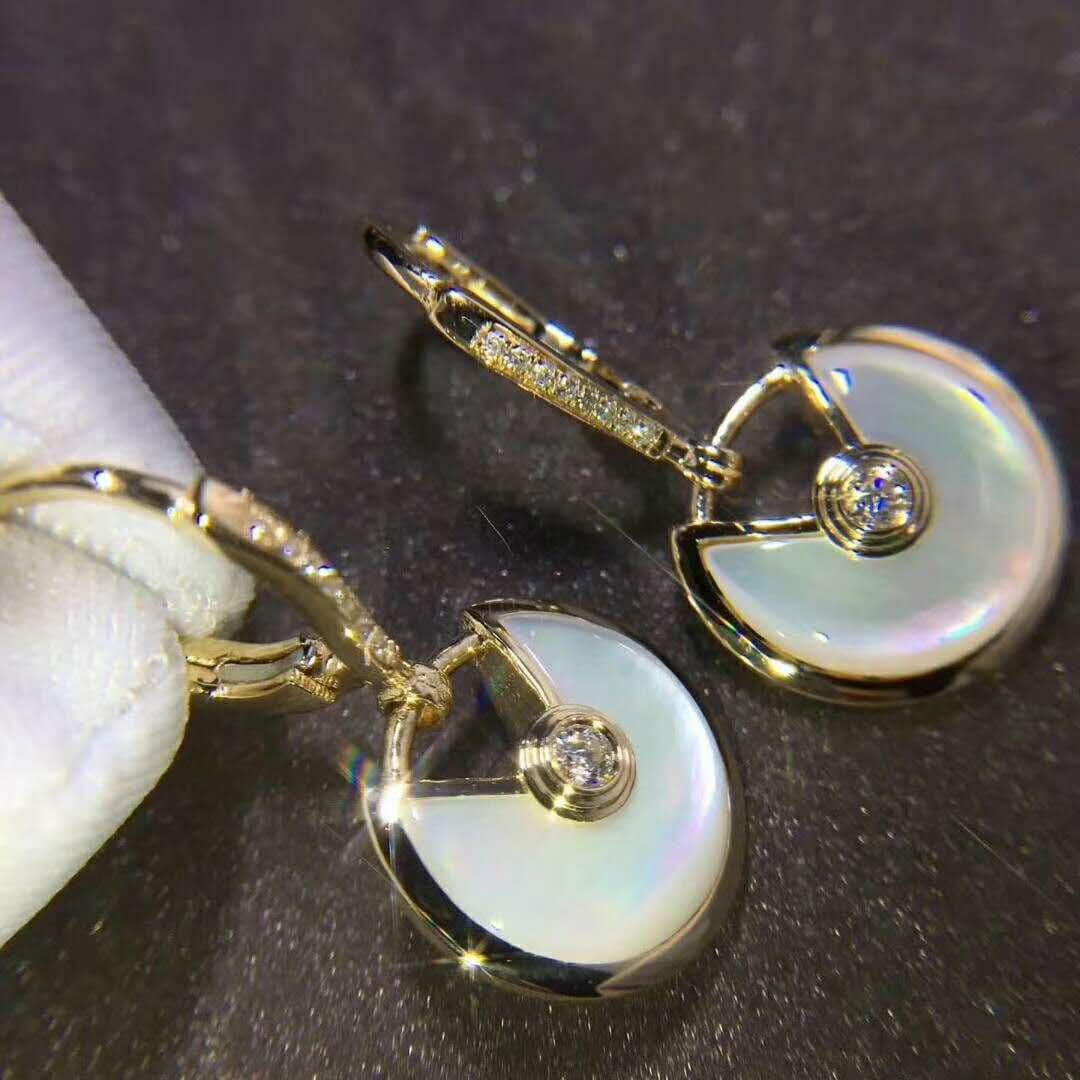Серьги Amulette de Cartier из желтого золота, 0,19ct 1