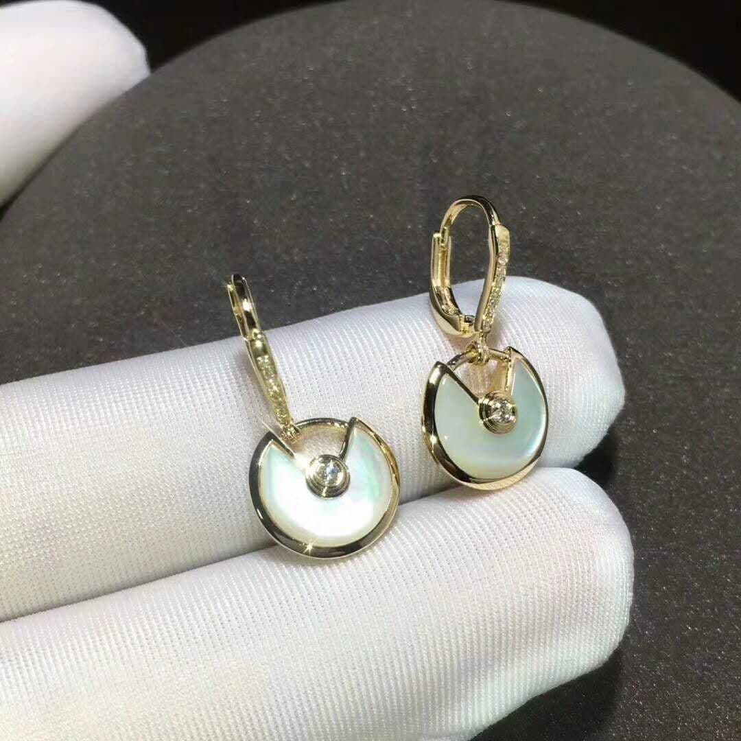 Серьги Amulette de Cartier из желтого золота, 0,19ct 4