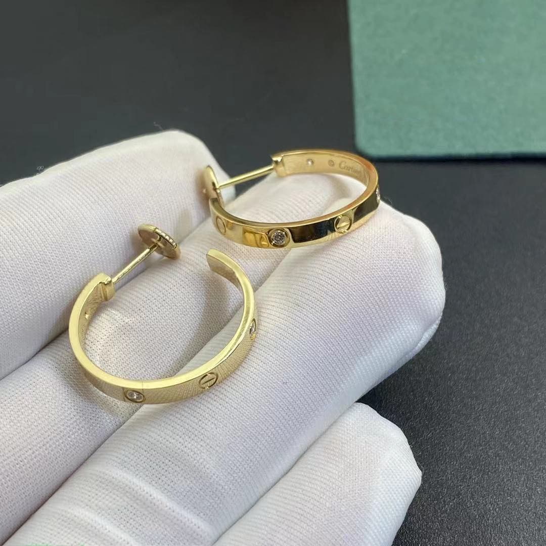 Золотые серьги Cartier, 0,22ct 4