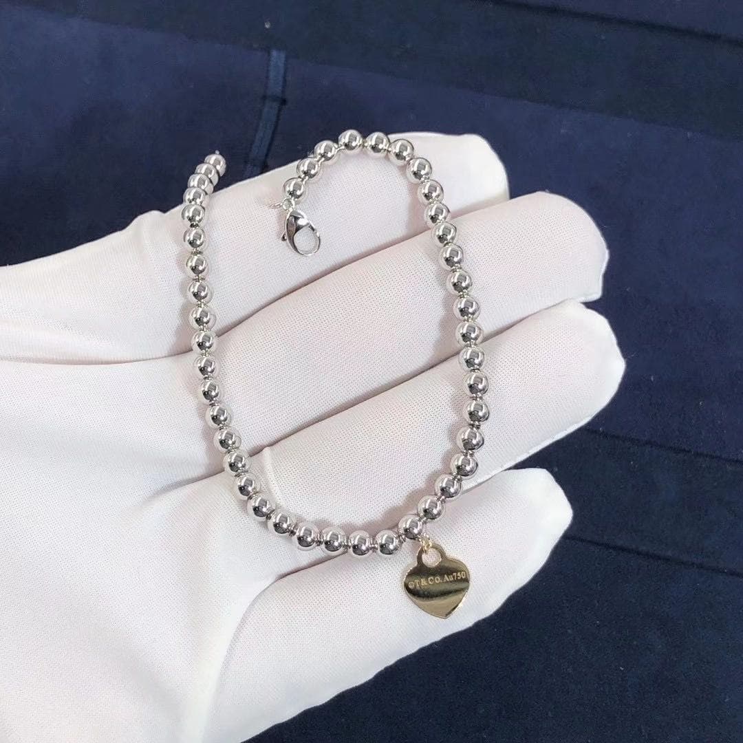 Браслет Tiffany с бусинами из белого золота 2
