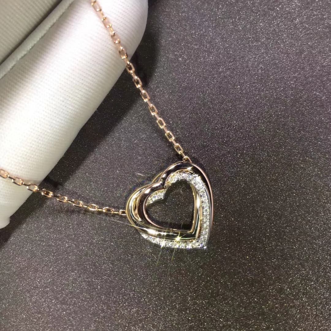 Колье Cartier Trinity из золота, 0,08ct 5