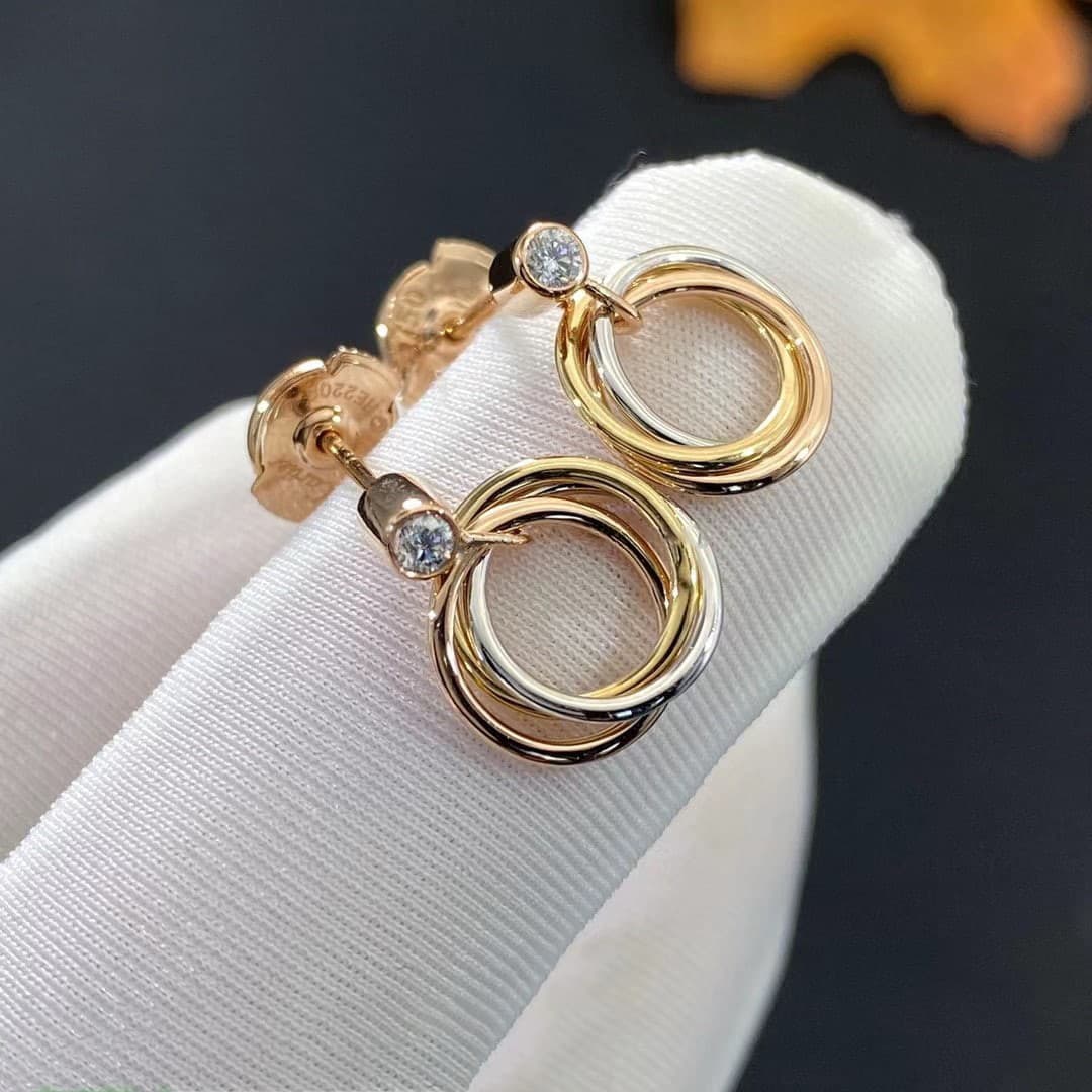Серьги Cartier Trinity 0,05ct, золото
