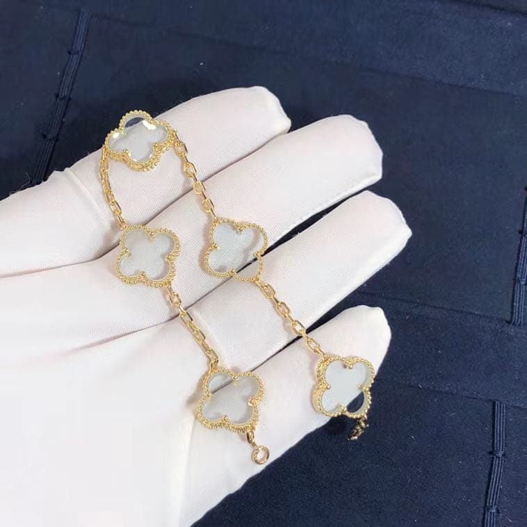 Браслет Van Cleef & Arpels 5 мотивов хрусталь, желтое золото 1