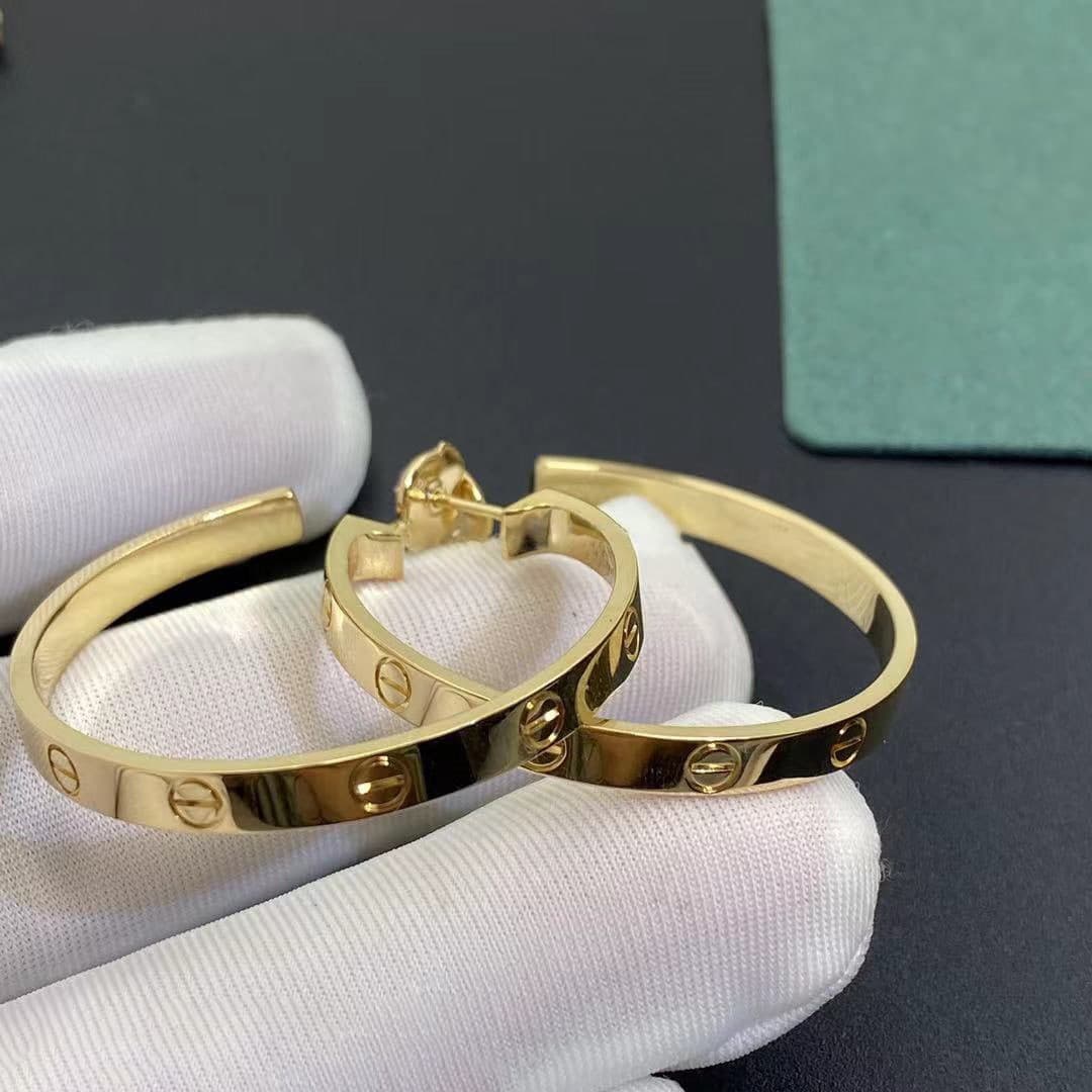 Серьги Cartier Love из желтого золота 4