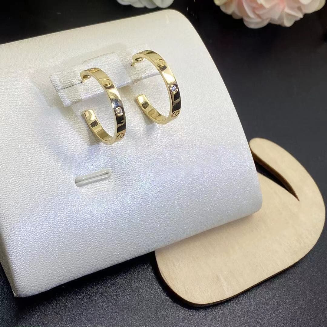 Серьги Cartier, золото 585 пробы, 0,04ct 5