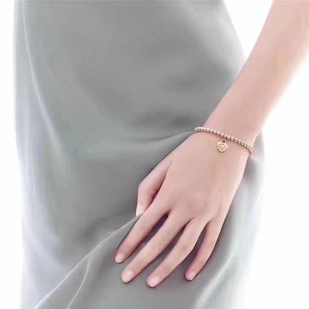 Браслет Tiffany с бусинами из белого золота 5