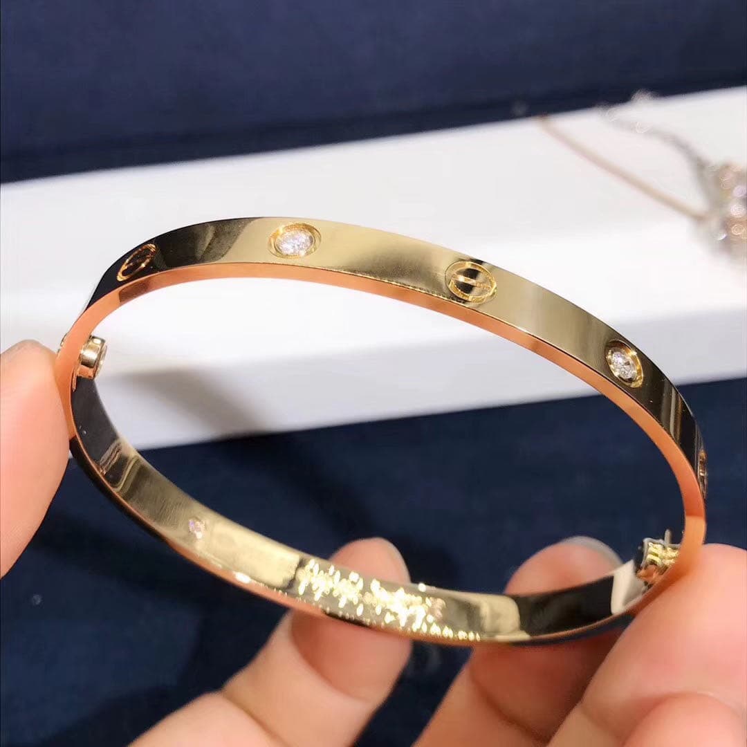 Браслет Cartier Love 4 бриллианта, желтое золото 1