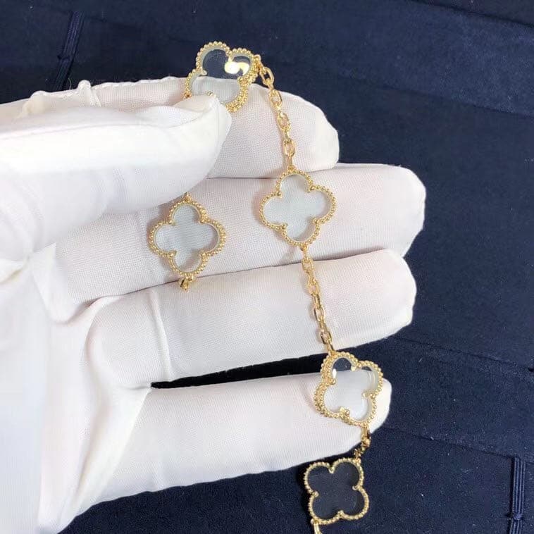 Браслет Van Cleef & Arpels 5 мотивов хрусталь, желтое золото 4