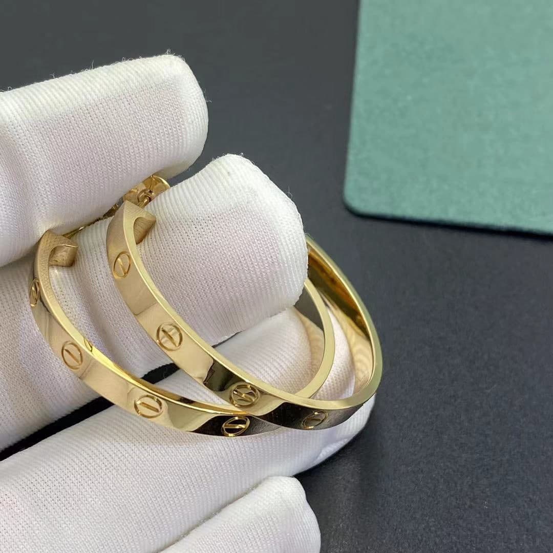 Серьги Cartier Love из желтого золота