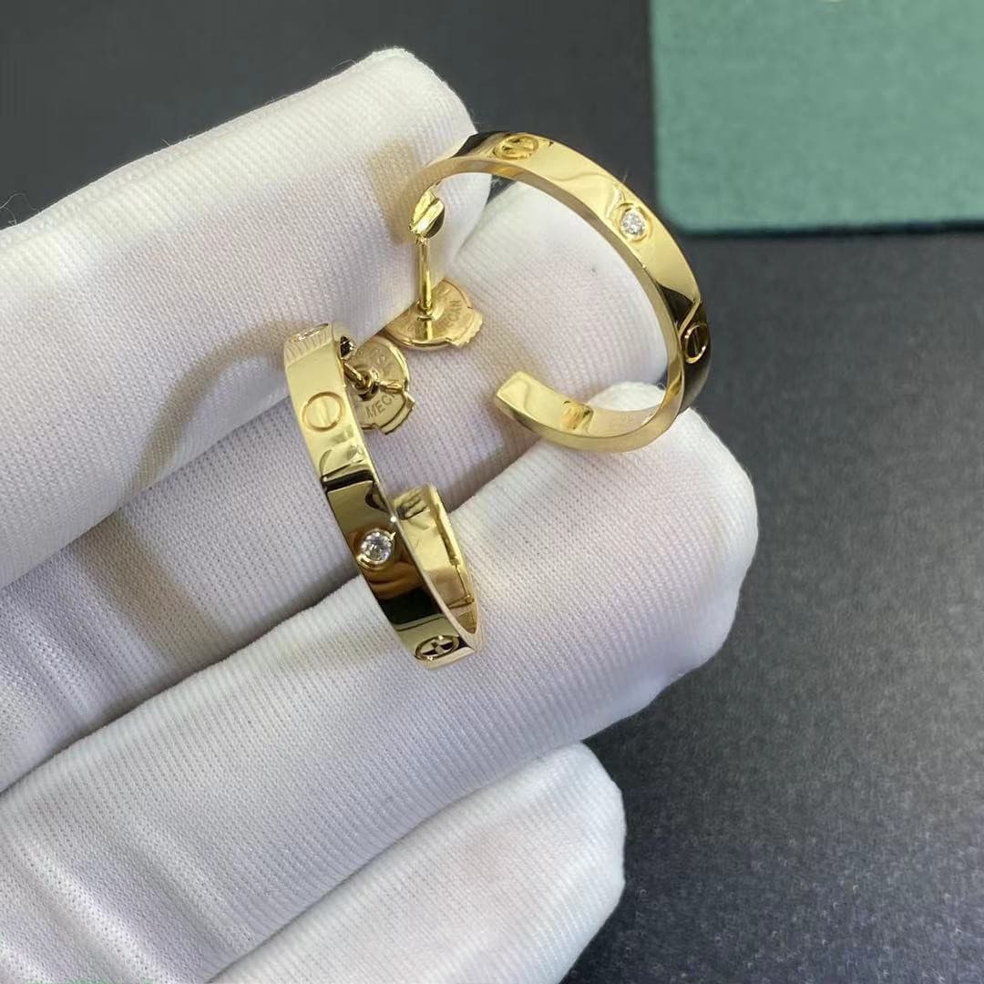 Золотые серьги Cartier, 0,22ct 2