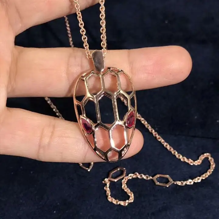Подвеска Bulgari Serpenti Seduttori /розовое золото, рубин/