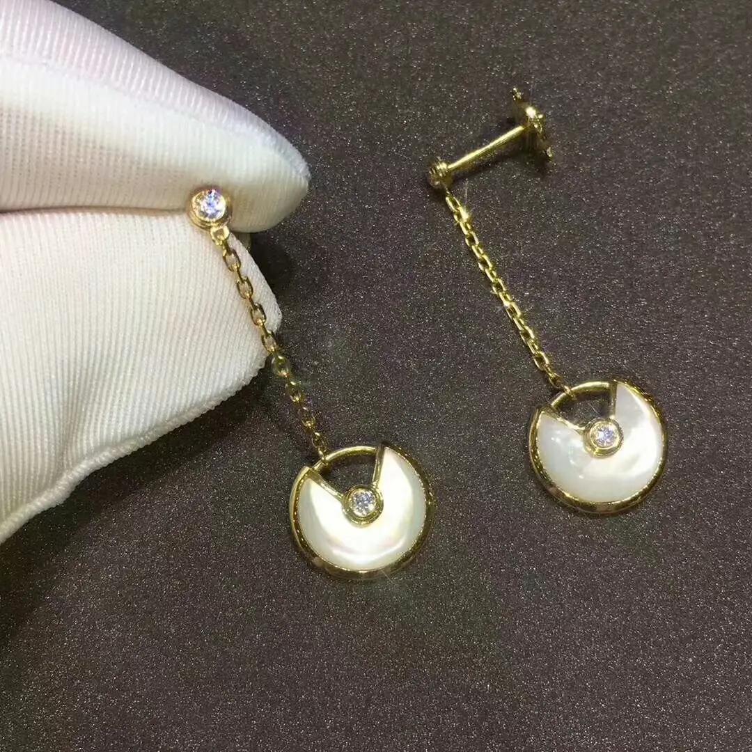 Серьги Amulette de Cartier /желтое золото, бриллианты/ 5