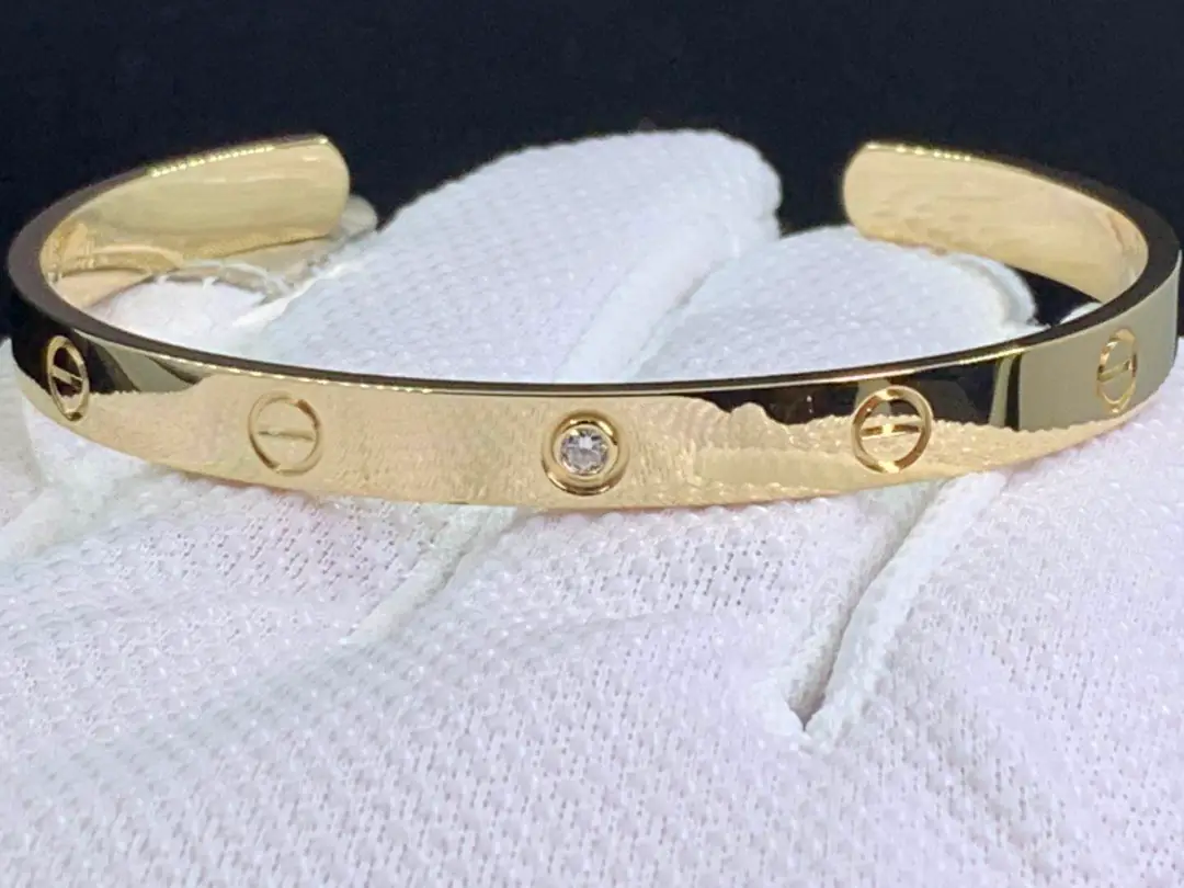 Браслет Cartier Love с открытой манжетой /1 бриллиант, желтое золото/