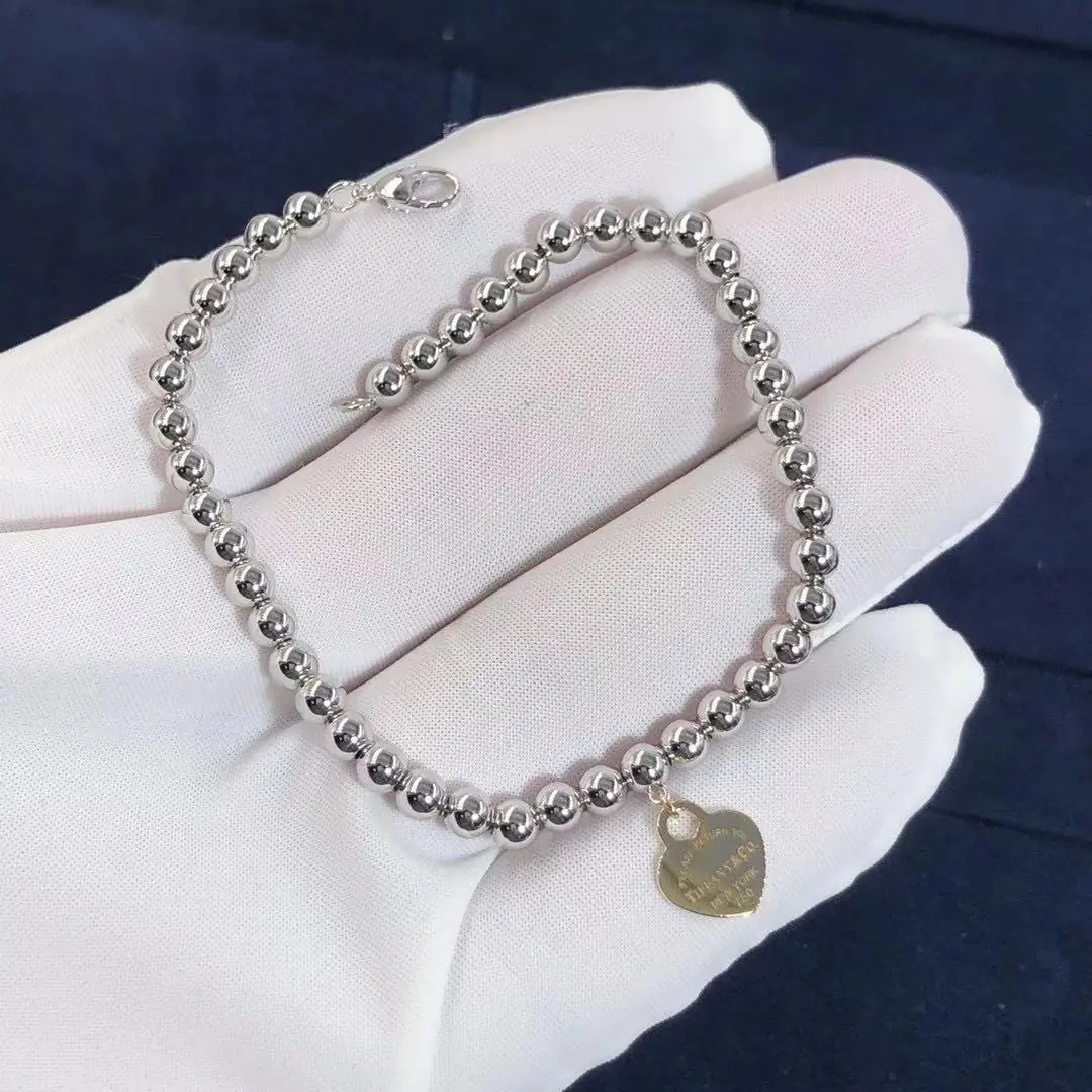 Браслет Tiffany с бусинами из белого золота