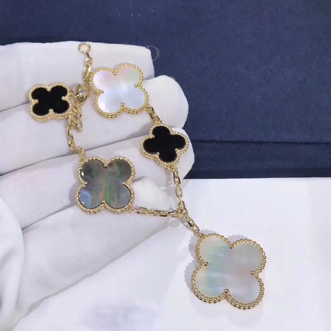 Браслет Van Cleef & Arpels Magic Alhambra 5 мотивов /желтое золото, перламутр, оникс/ 1