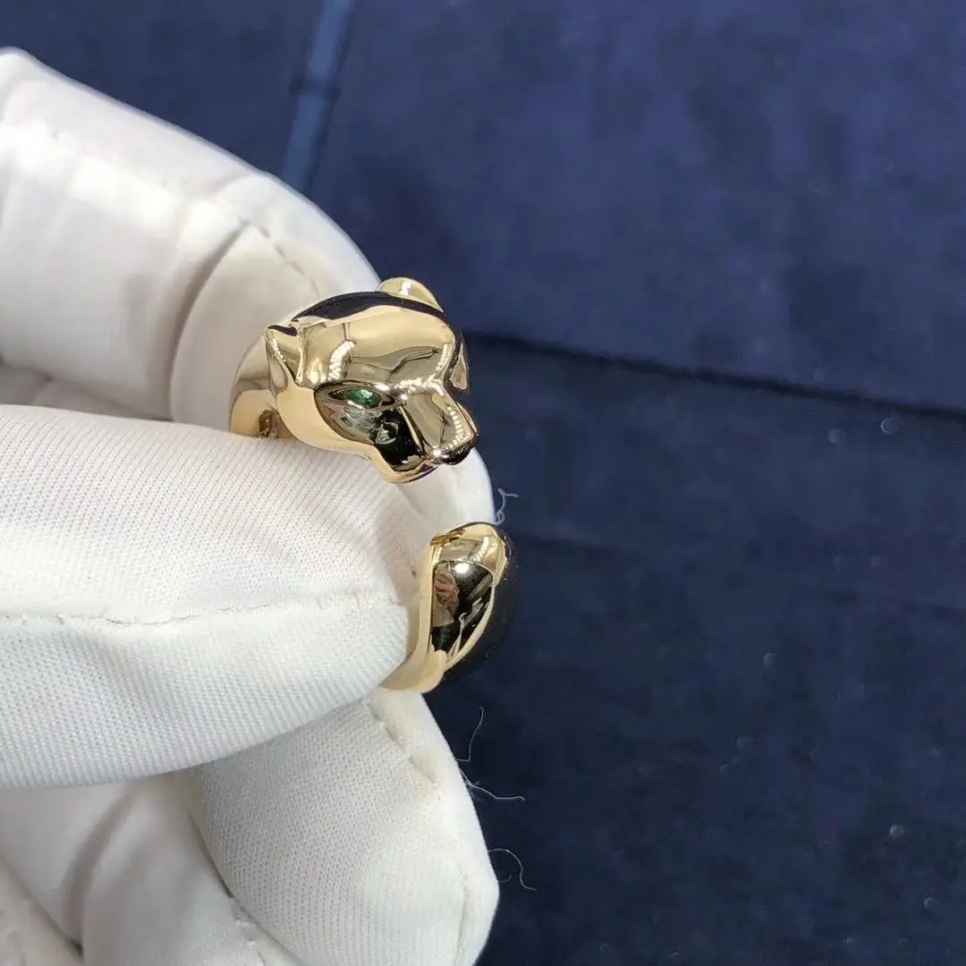 Кольцо Panthere de Cartier /драгоценные камни, желтое золото/
