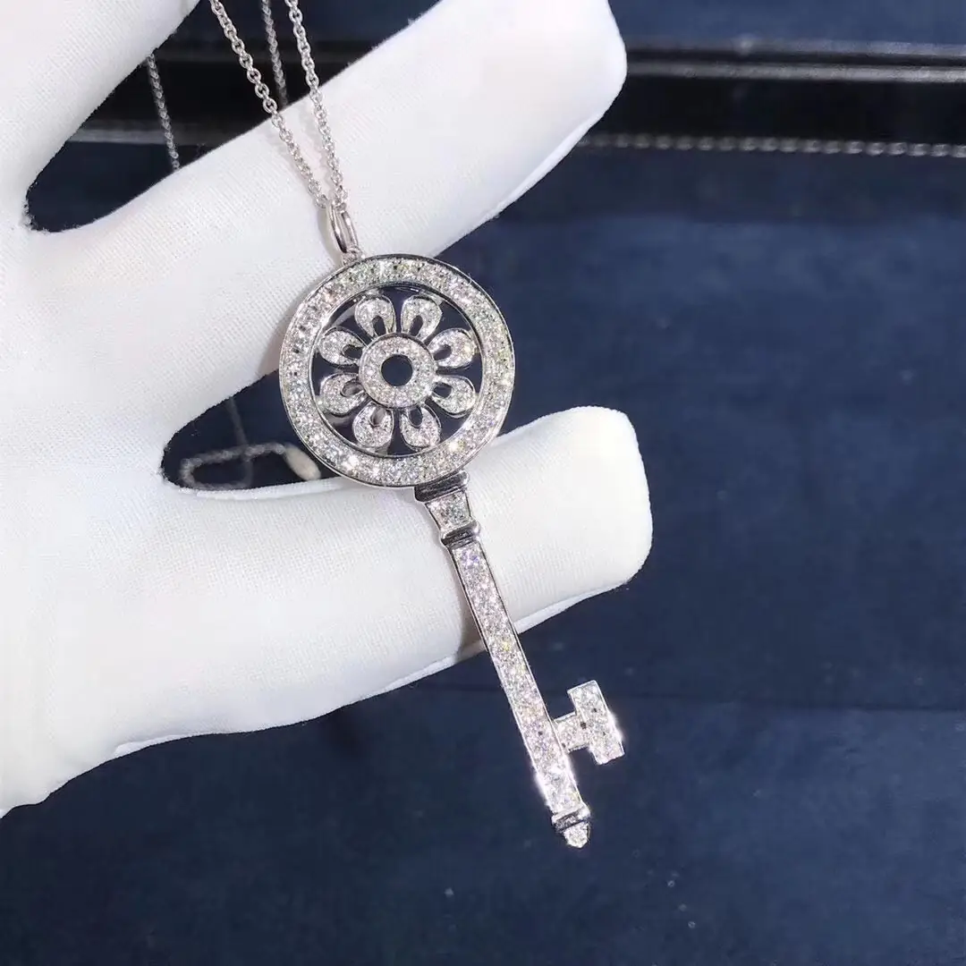 Колье Tiffany &amp; Co. Petal Key с бриллиантовым паве /белое, розовое золото/ 11