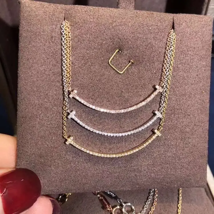 Подвеска Tiffany T Smile /бриллианты, розовое, белое, желтое золото/