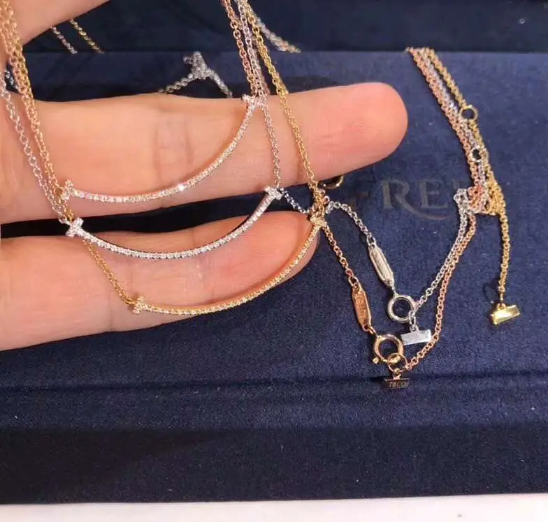 Подвеска Tiffany T Smile /бриллианты, розовое, белое, желтое золото/ 6