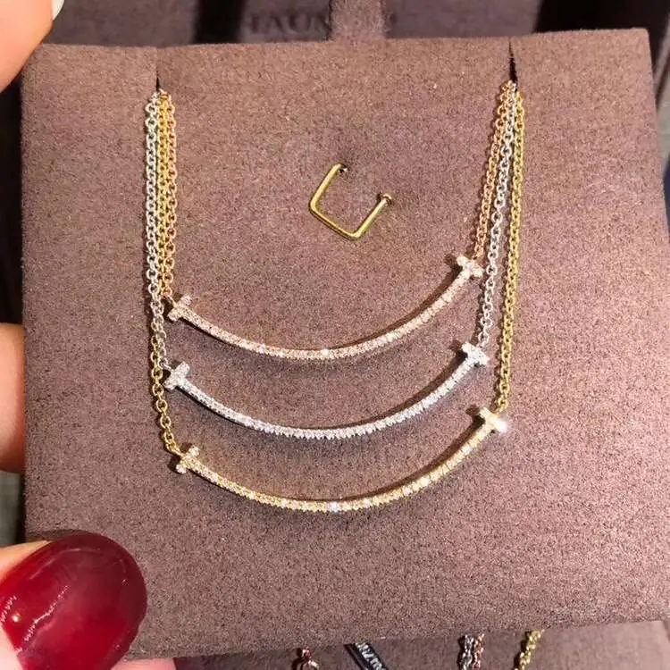 Подвеска Tiffany T Smile /бриллианты, розовое, белое, желтое золото/