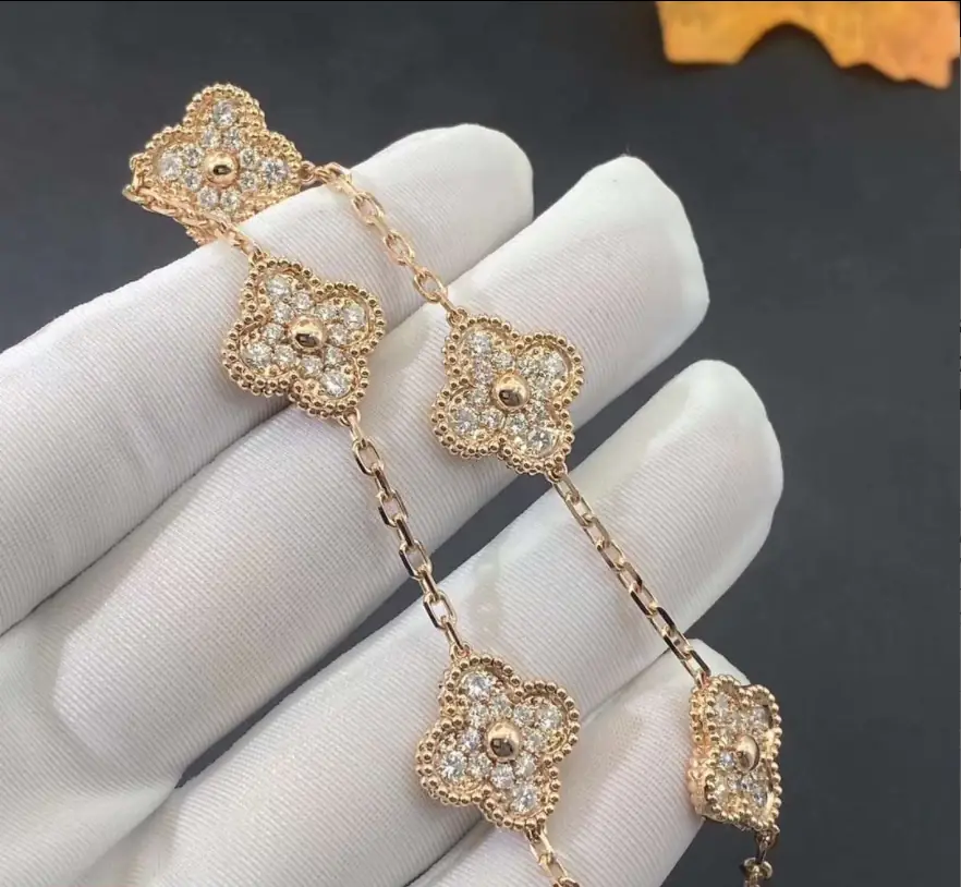 Браслет Van Cleef &amp; Arpels  с 5 мотивами /бриллианты, желтое золото/