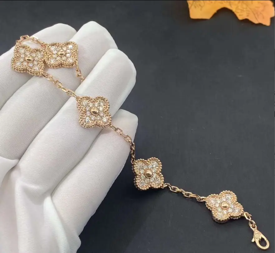 Браслет Van Cleef &amp; Arpels  с 5 мотивами /бриллианты, желтое золото/