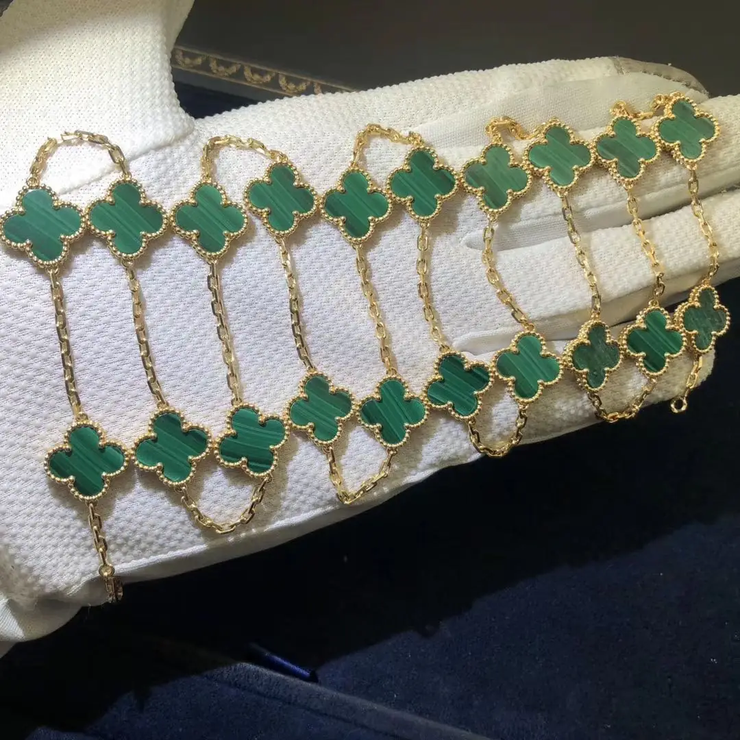 Колье Van Cleef & Arpels c 20 мотивами /желтое золото, малахиты/