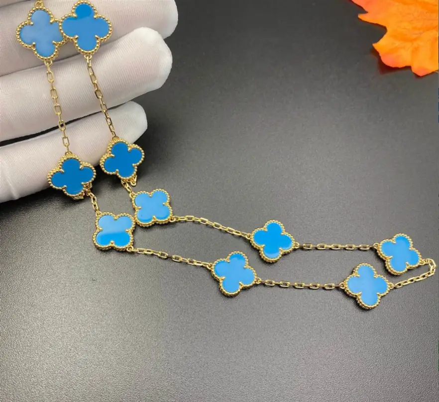 Колье Van Cleef & Arpels Alhambra с 10 мотивами /желтое золото, агаты/