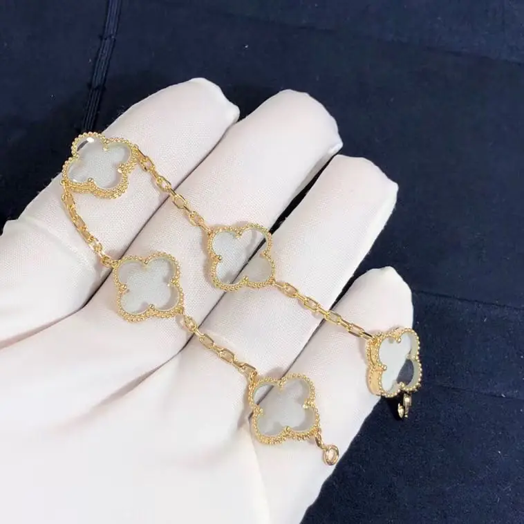 Браслет Van Cleef & Arpels 5 мотивов /хрусталь, желтое золото/