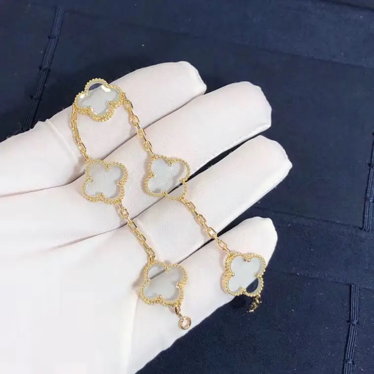 Браслет Van Cleef & Arpels 5 мотивов /хрусталь, желтое золото/