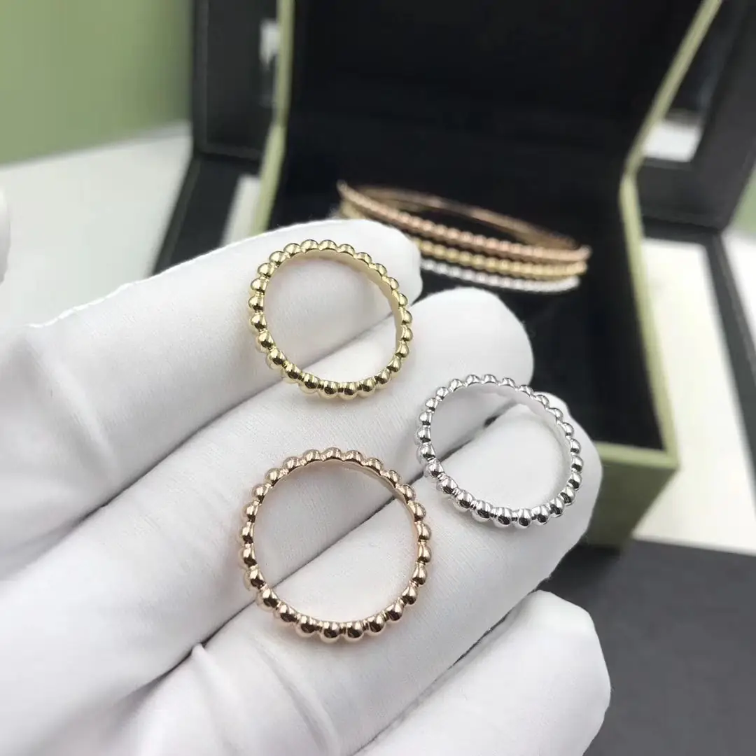 Кольцо Van Cleef &amp; Arpels Perlée /розовое, белое, желтое золото/