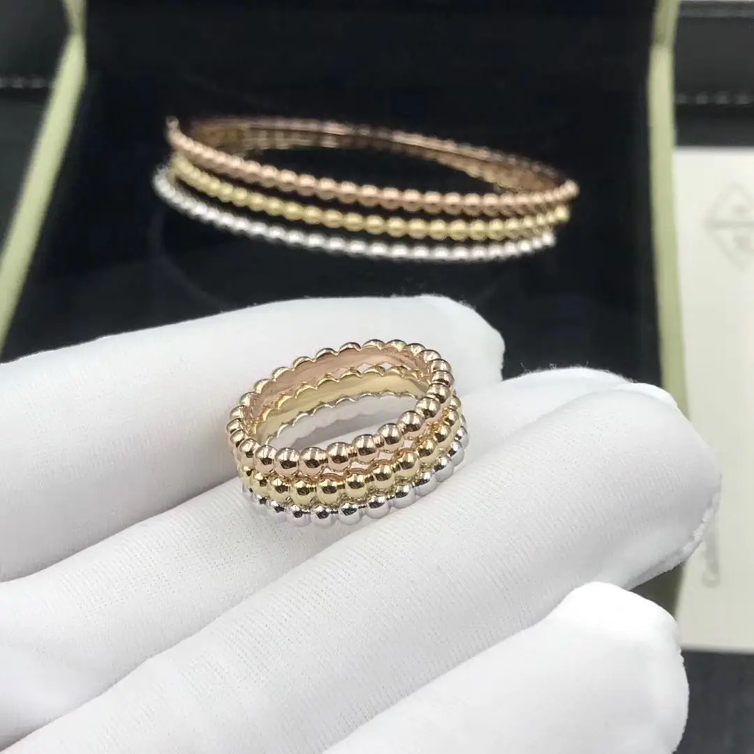 Кольцо Van Cleef &amp; Arpels Perlée /розовое, белое, желтое золото/