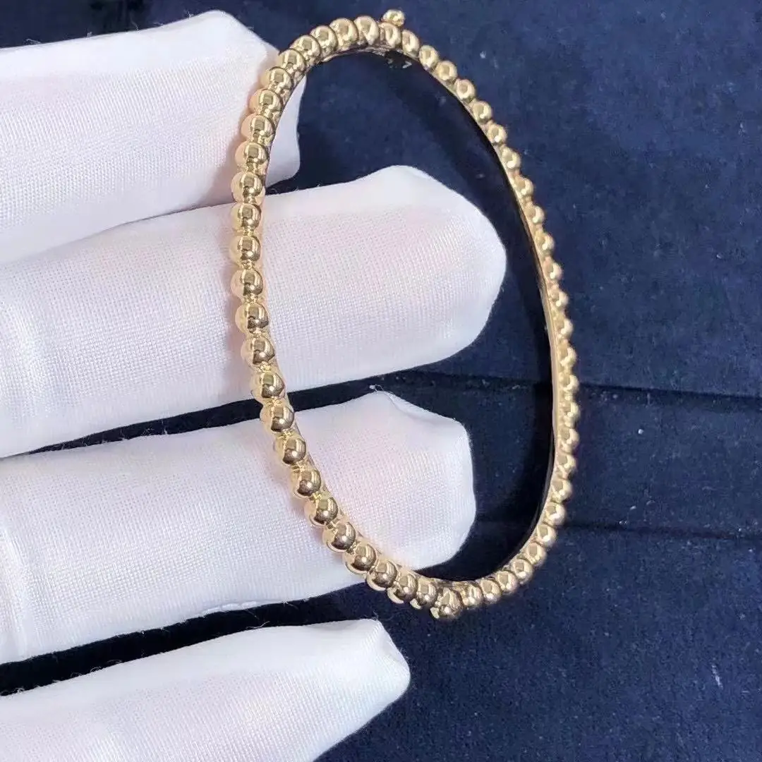 Браслет Van Cleef & Arpels Perlée Pearls of Gold /желтое золото/