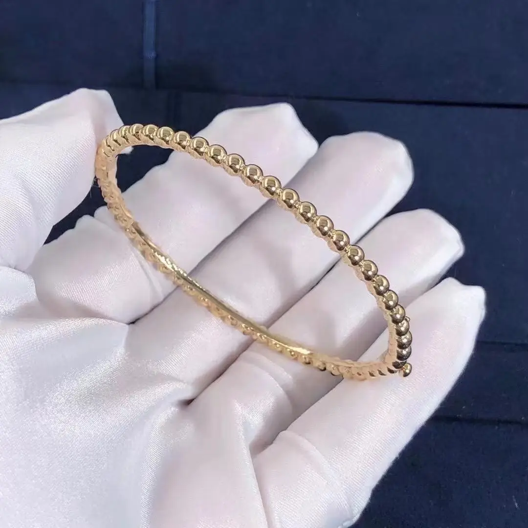 Браслет Van Cleef & Arpels Perlée Pearls of Gold /желтое золото/